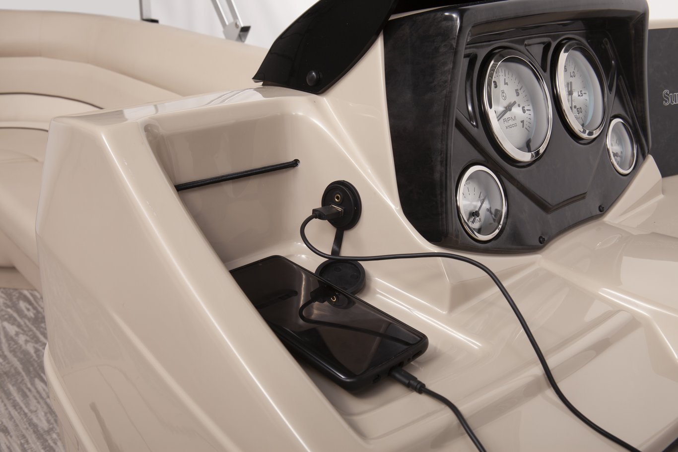 https://www.suncatcherpontoons.com/wp/wp-content/uploads/sites/2/2021/07/Elite-322-C-Lighted-Cup-Holders-in-Couch-Tan-Interior-scaled.jpg