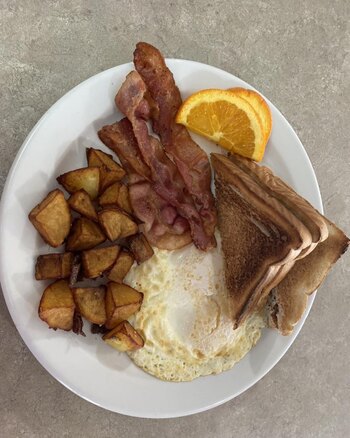 KIDS EGGS (2), BACON OR SAUSAGE, HOME FRIES & TOAST (1)