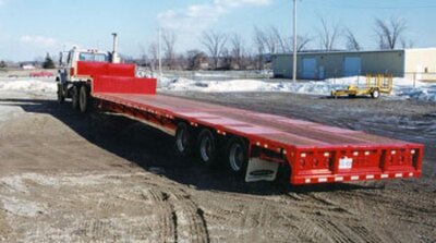 J.C. Single drop extendable trailer with low profile tires, deck height 34