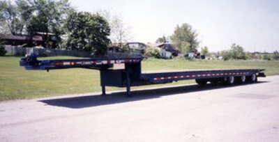 J.C. Sliding axle hydraulic tilt deck trailer