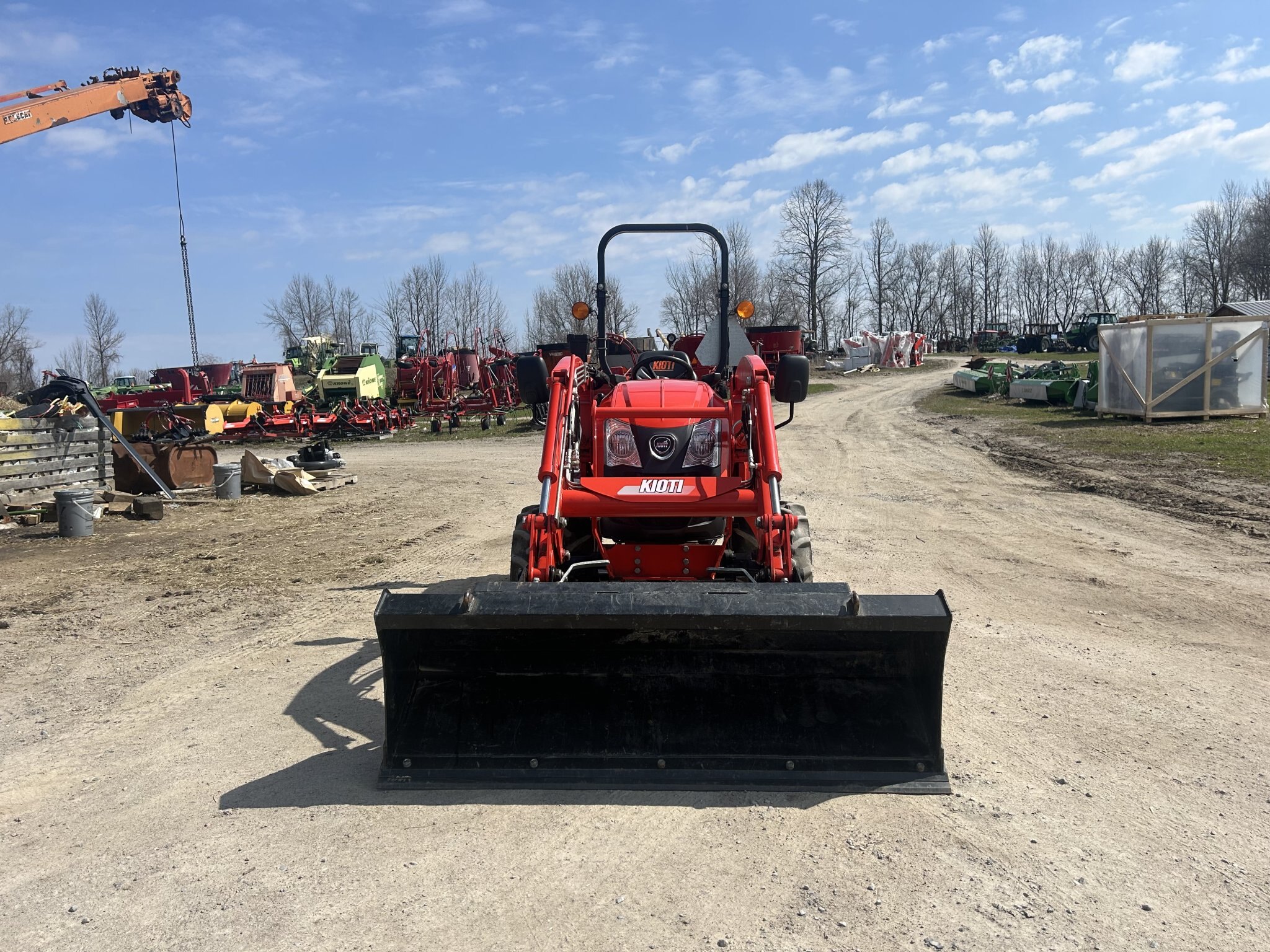 Kioti DK55 with BER-VAC 1425 Front Mount Blower