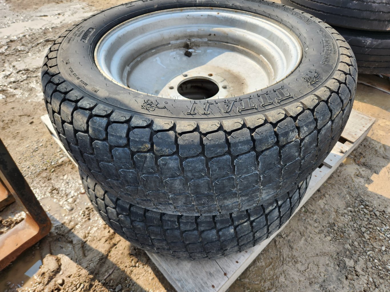 Titan LSW305 521 R3 turf tires on rims