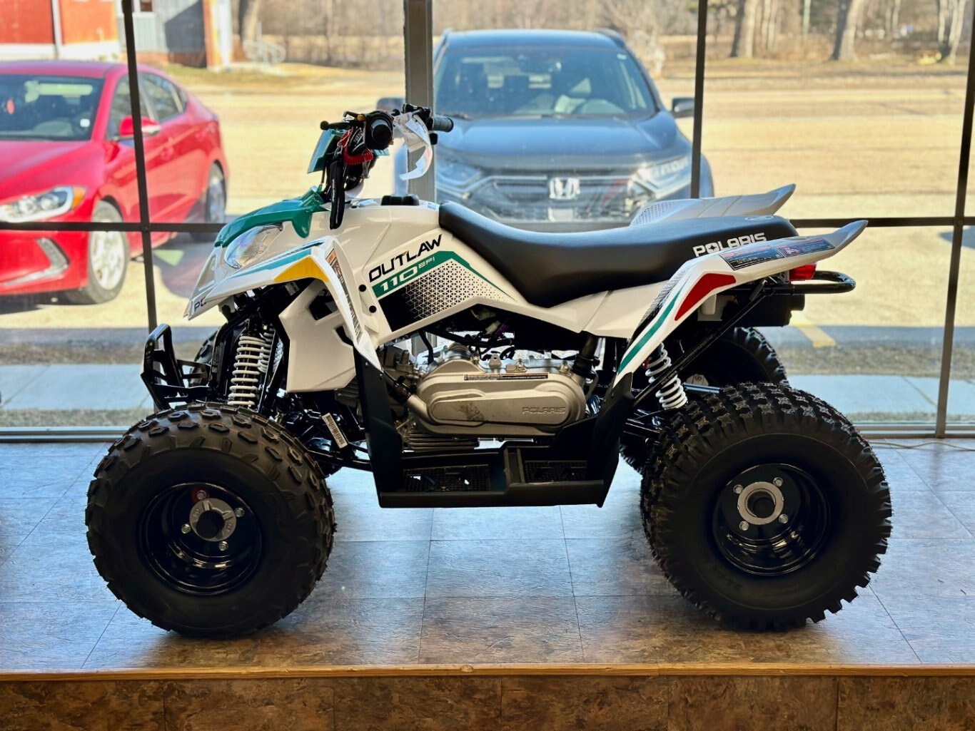 2024 Polaris OUTLAW 110 EFI BRIGHT WHITE / RADIANT GREEN