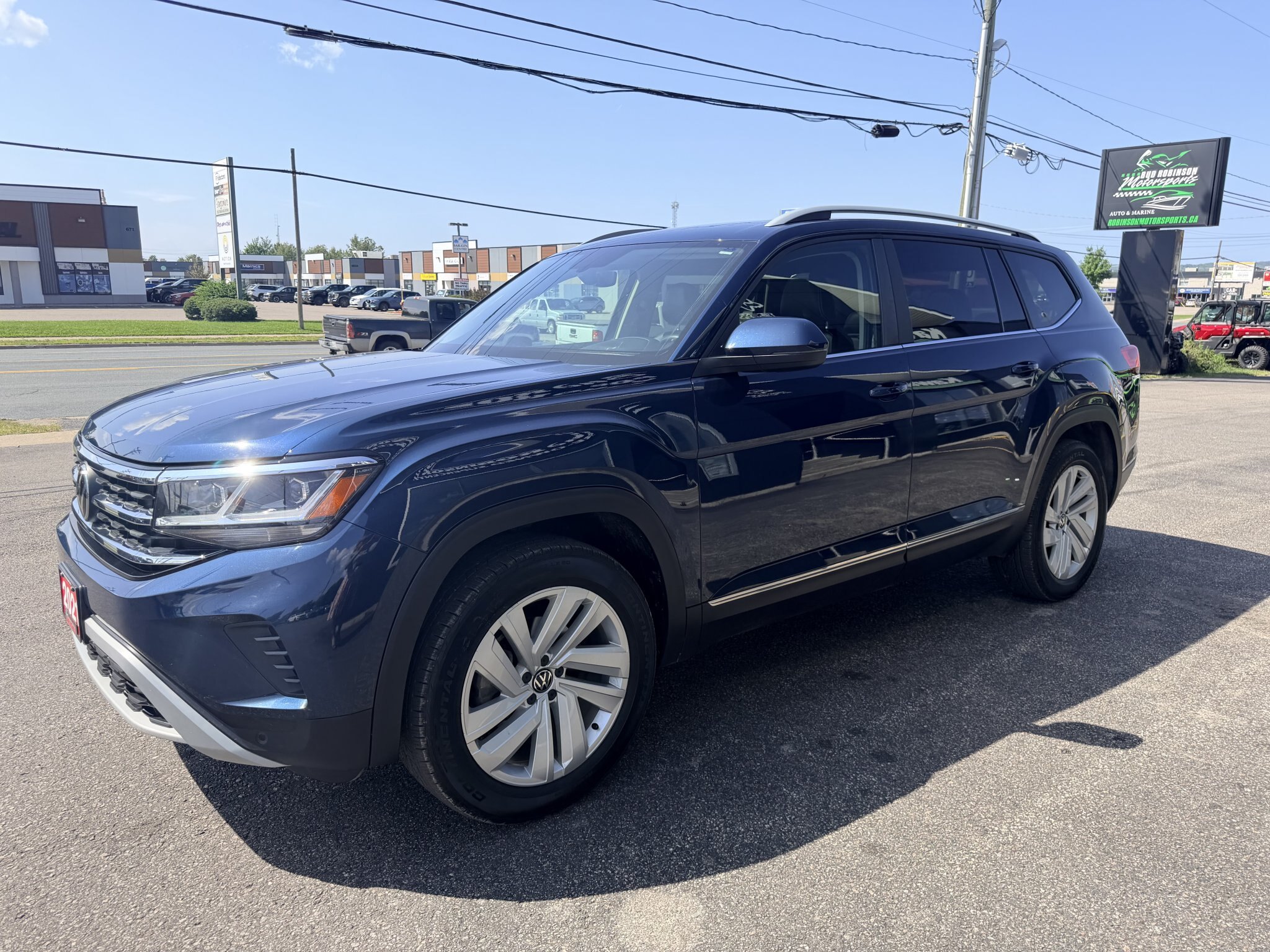 2021 VOLKSWAGEN ATLAS HIGHLINE 4MOTION SEL AWD 7 PASSENGER SEATING W/SUMMER AND WINTER TIRES, REMOTE START, LEATHER SEATS, HEATED/COOLED SEATS, HEATED STEERING WHEEL, SUNROOF, POWER LIFTGATE, REARVIEW CAMERA AND NAVIGATION!