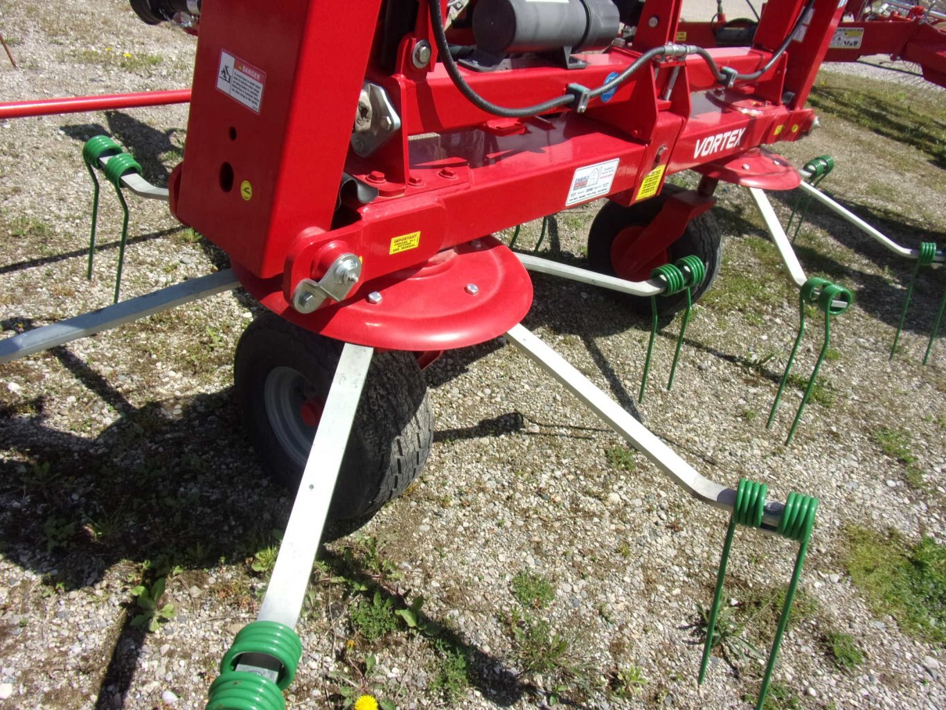 Farm King 570 Vortex Tedder