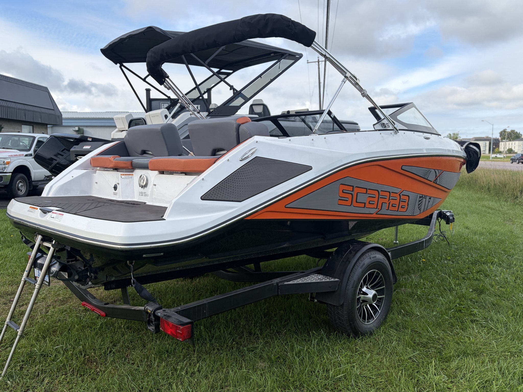 2026 Scarab 195 LX – Charcoal/Orange