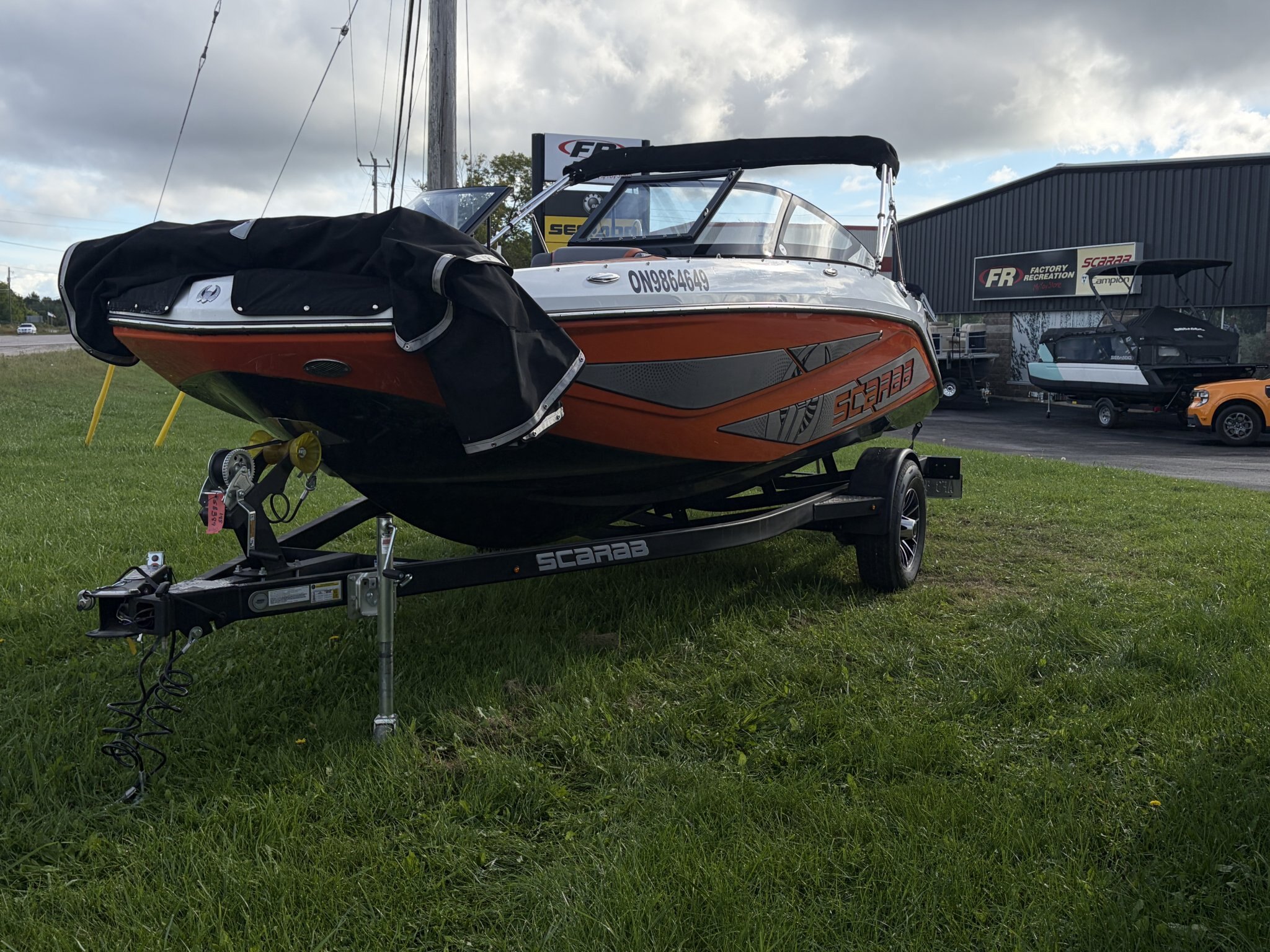 2026 Scarab 195 LX – Charcoal/Orange