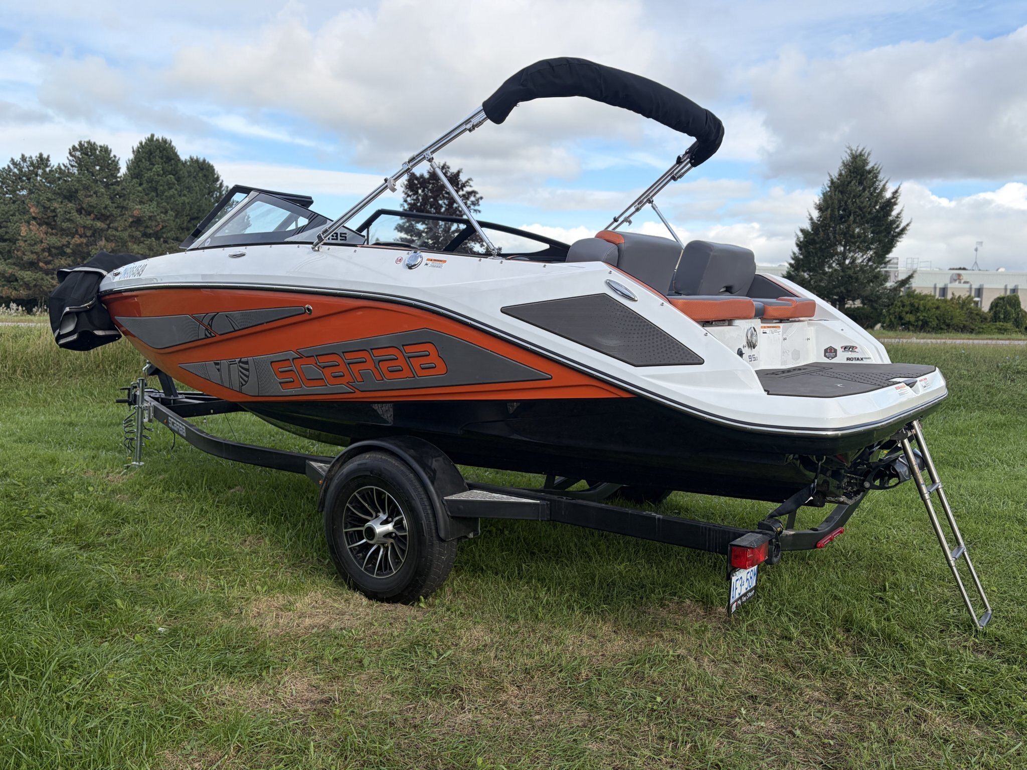 2026 Scarab 195 LX – Charcoal/Orange