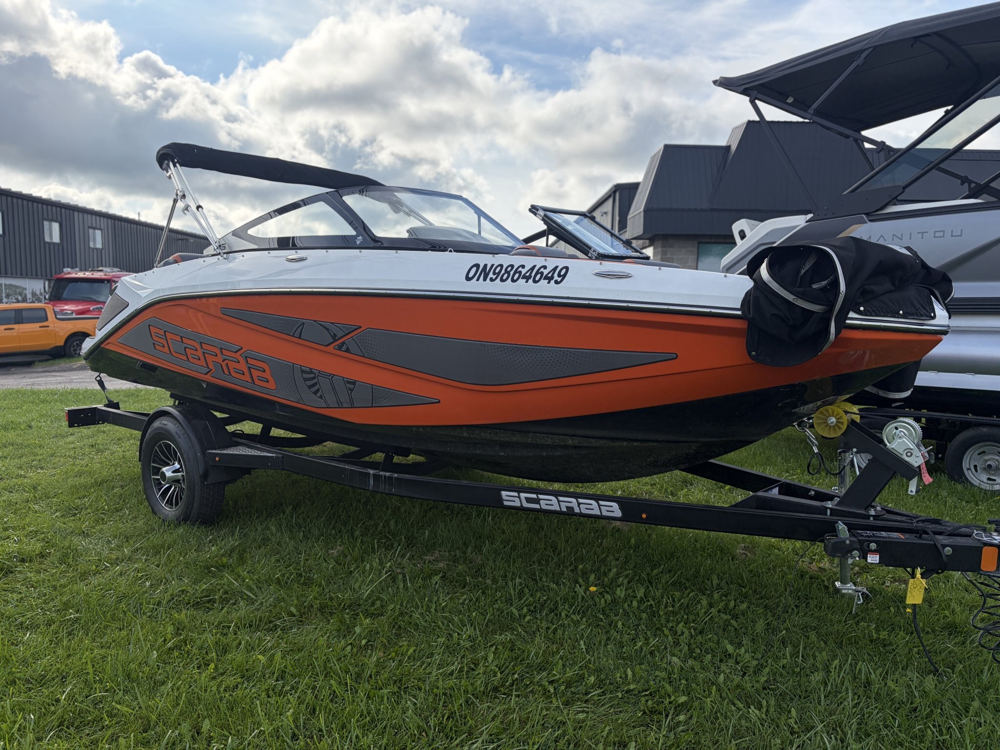 2026 Scarab 195 LX – Charcoal/Orange