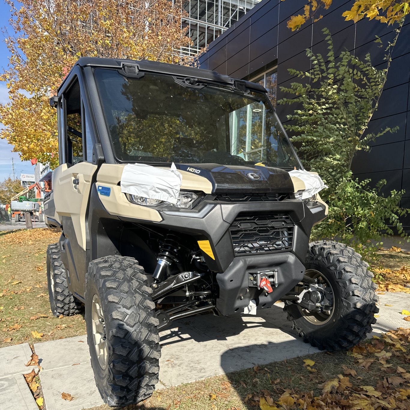 2025 Can-Am DEFENDER LTD Cab  Rotax HD10 V-twin engine Desert Tan / Stealth Black