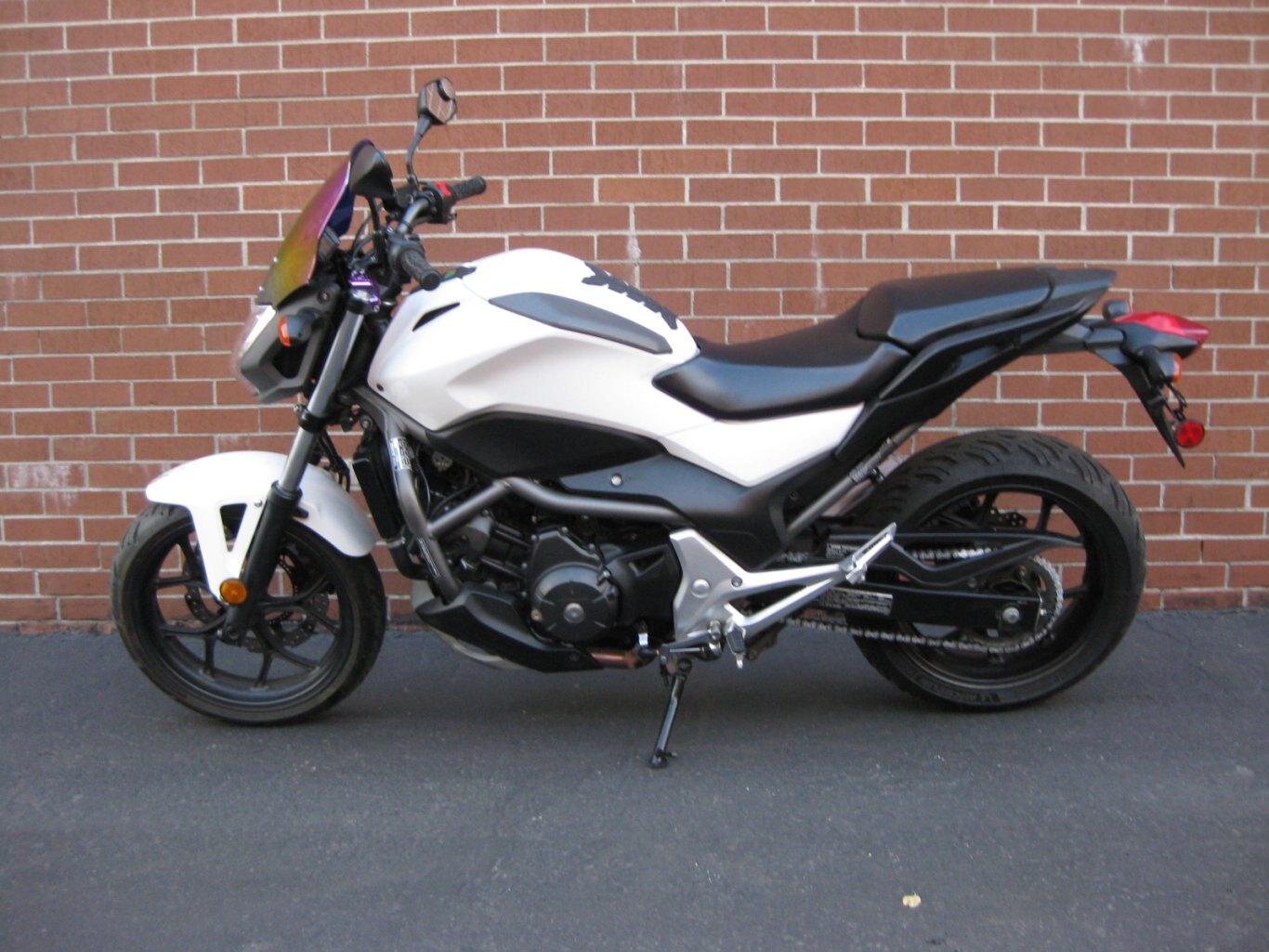 2013 HONDA NCX 700 SA CONGRATULATIONS SIR AHMAD THE ROAD WARRIOR ON THE ADOPTION OF THE HONDA NCX700SA THE ULTIMATE STREET FIGHTER THE WHITE LIGHTNING COMBINES POWER, PERFORMANCE & COMFORT EITHER CUTTIN CITY GRID OR CARVIN CANYONS YOU WILL ARRIVE IN STYLE CONGRATS FROM GARY & TEAM CYCLE WORLD !!!!