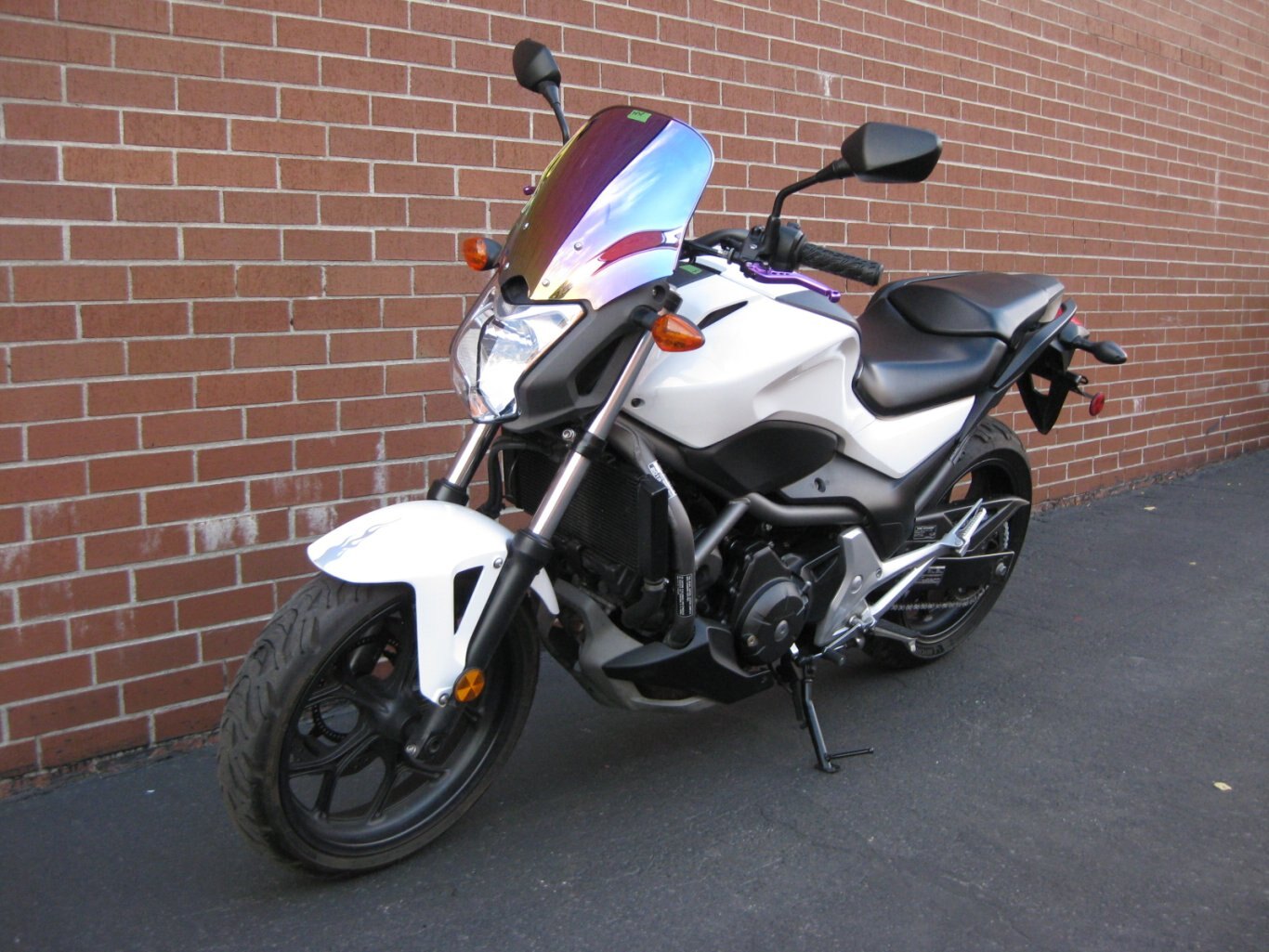 2013 HONDA NCX 700 SA CONGRATULATIONS SIR AHMAD THE ROAD WARRIOR ON THE ADOPTION OF THE HONDA NCX700SA THE ULTIMATE STREET FIGHTER THE WHITE LIGHTNING COMBINES POWER, PERFORMANCE & COMFORT EITHER CUTTIN CITY GRID OR CARVIN CANYONS YOU WILL ARRIVE IN STYLE CONGRATS FROM GARY & TEAM CYCLE WORLD !!!!