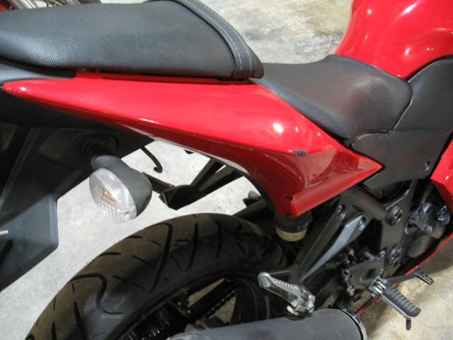 Low km 2012 Ninja 250 with a few scrapes