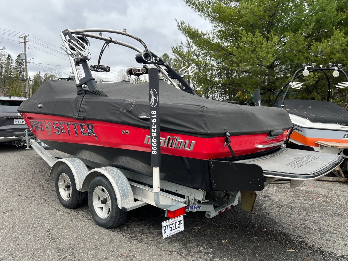 Bateau Malibu Wakesetter VLX 21.6' 2012 Rouge & Noir Moteur Monsoon 350hp 525h Full, Remorque , 6x Ballasts, Power Wedge, SurfGates !