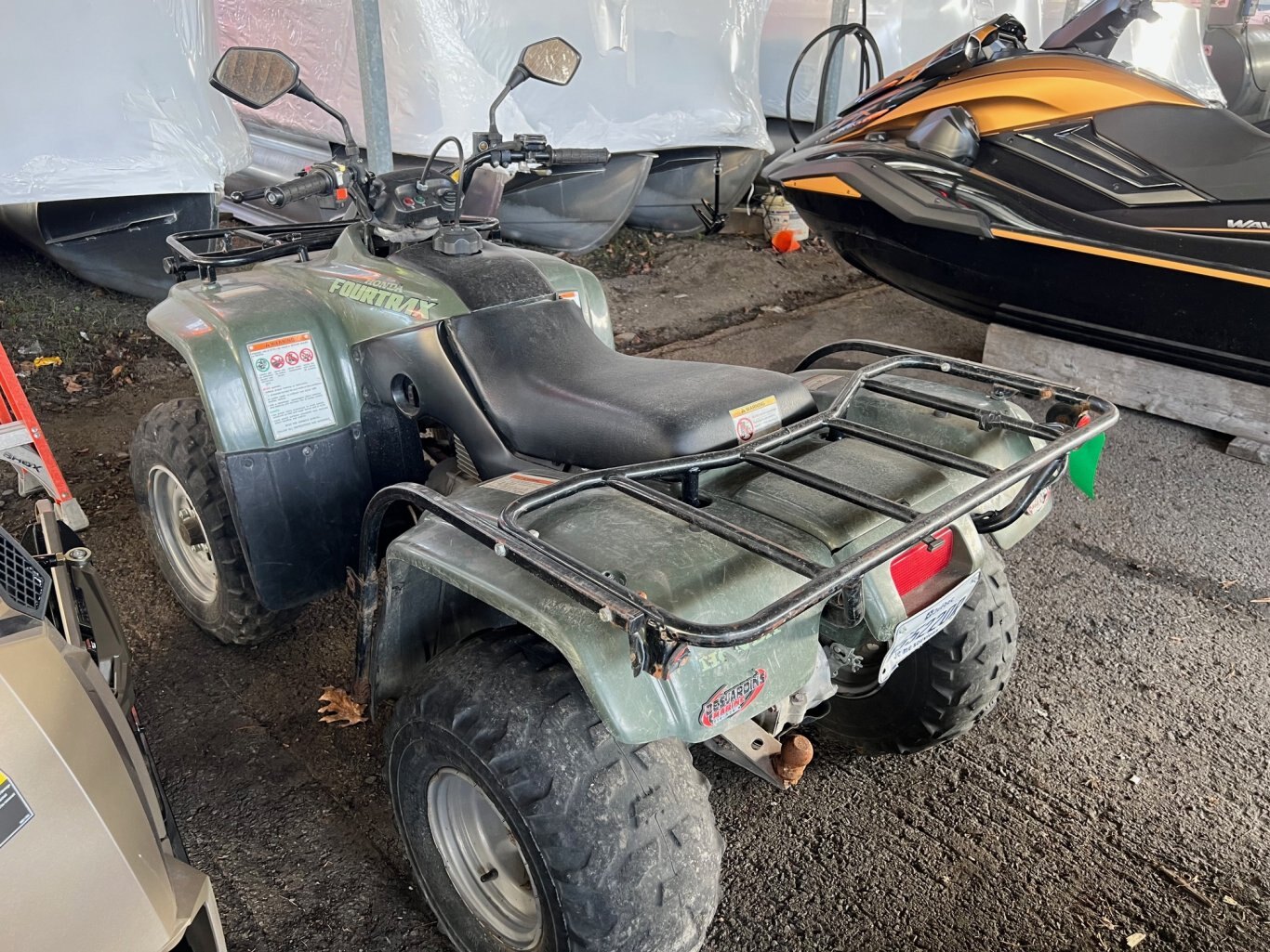 VTT Honda TRX 250 2001 2x4 Vert en bonne état pneus usés.