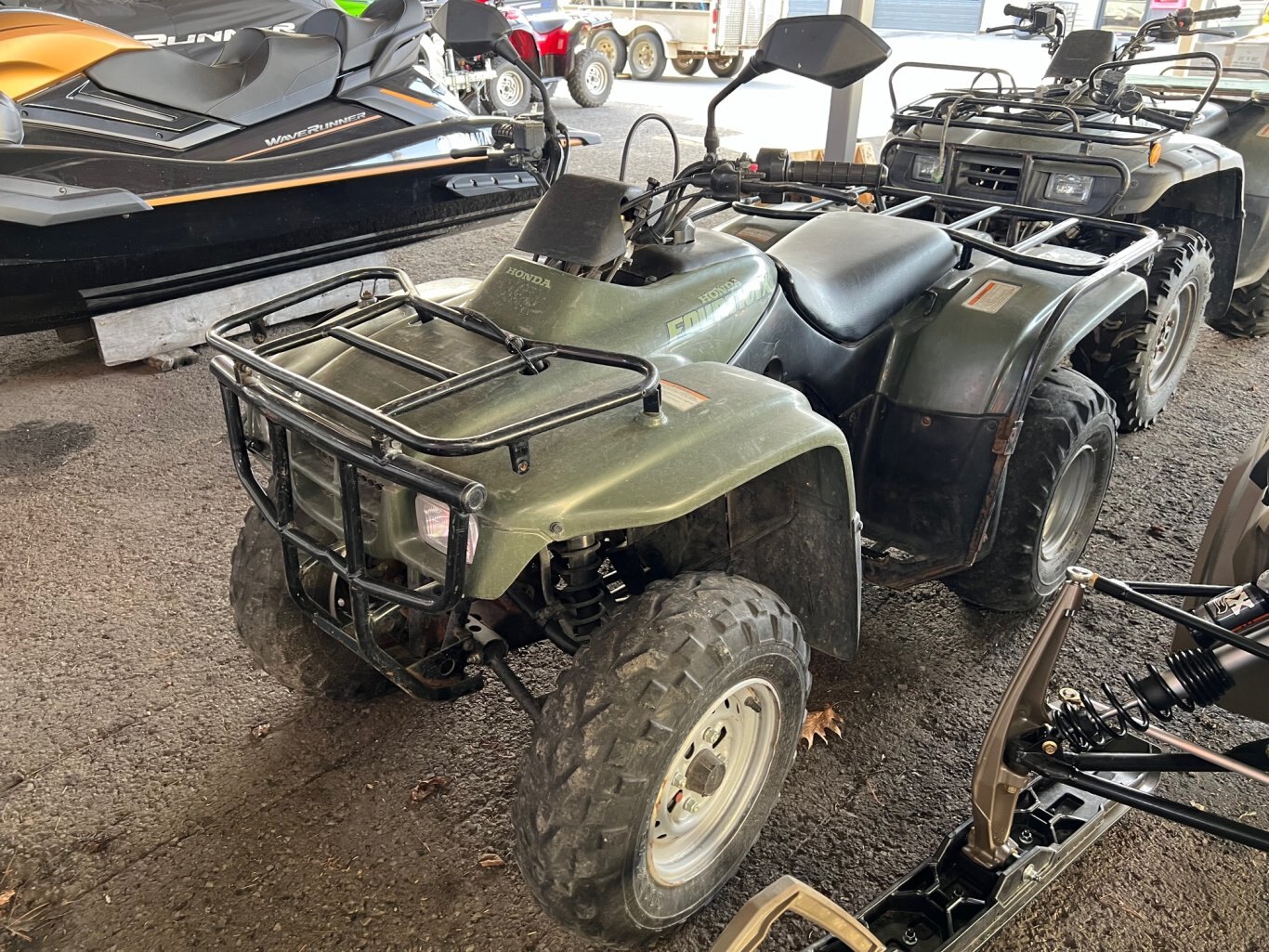 VTT Honda TRX 250 2001 2x4 Vert en bonne état pneus usés.