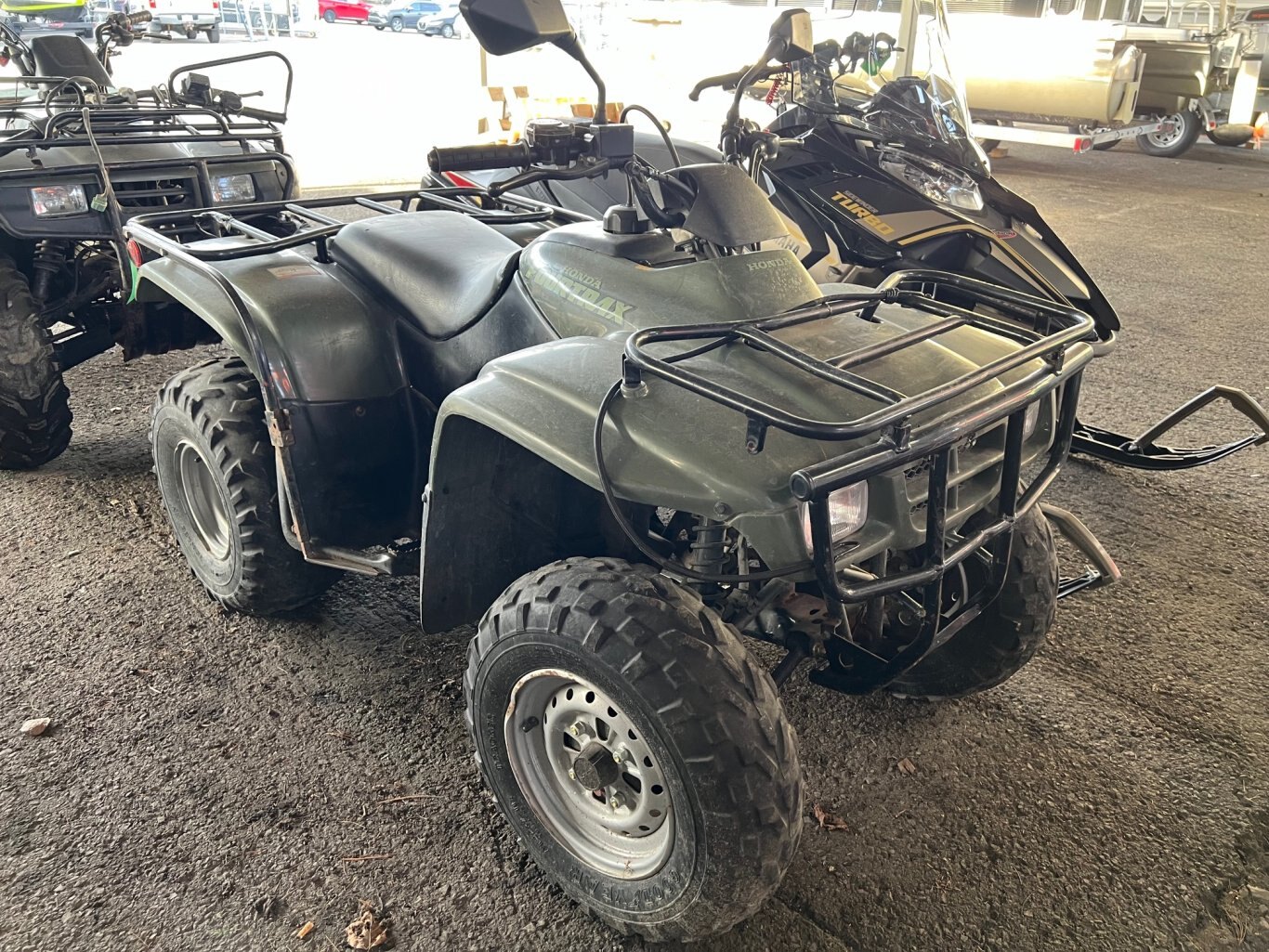 VTT Honda TRX 250 2001 2x4 Vert en bonne état pneus usés.