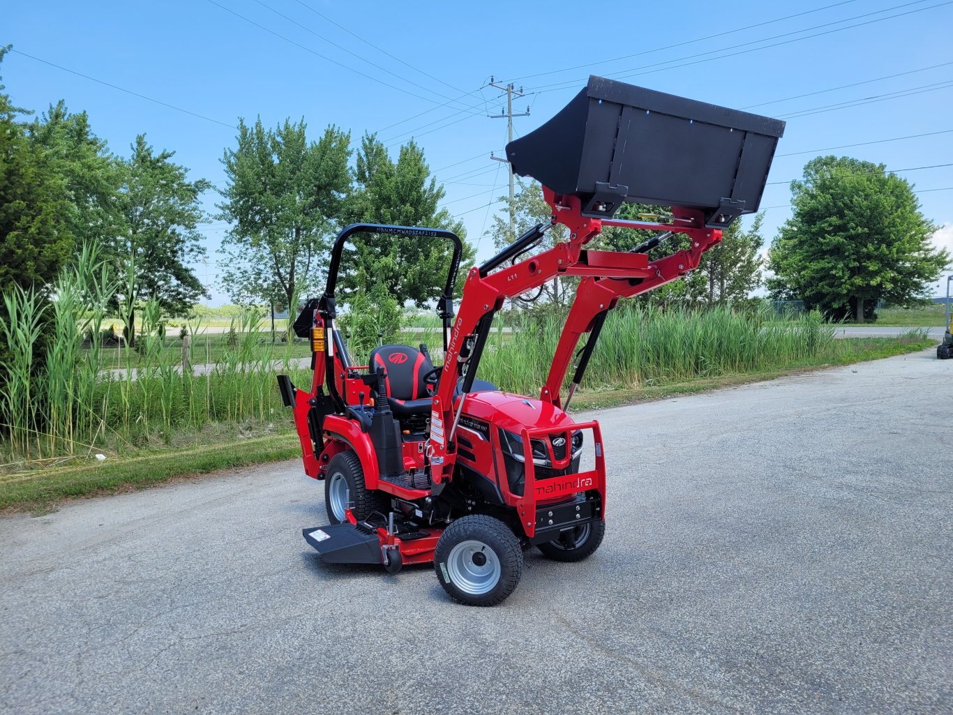 2025 Mahindra 1120 HST 20hp w/Loader, Backhoe, Mower Deck