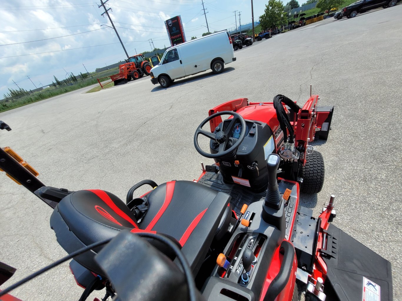 2025 Mahindra 1120 HST 20hp w/Loader, Backhoe, Mower Deck