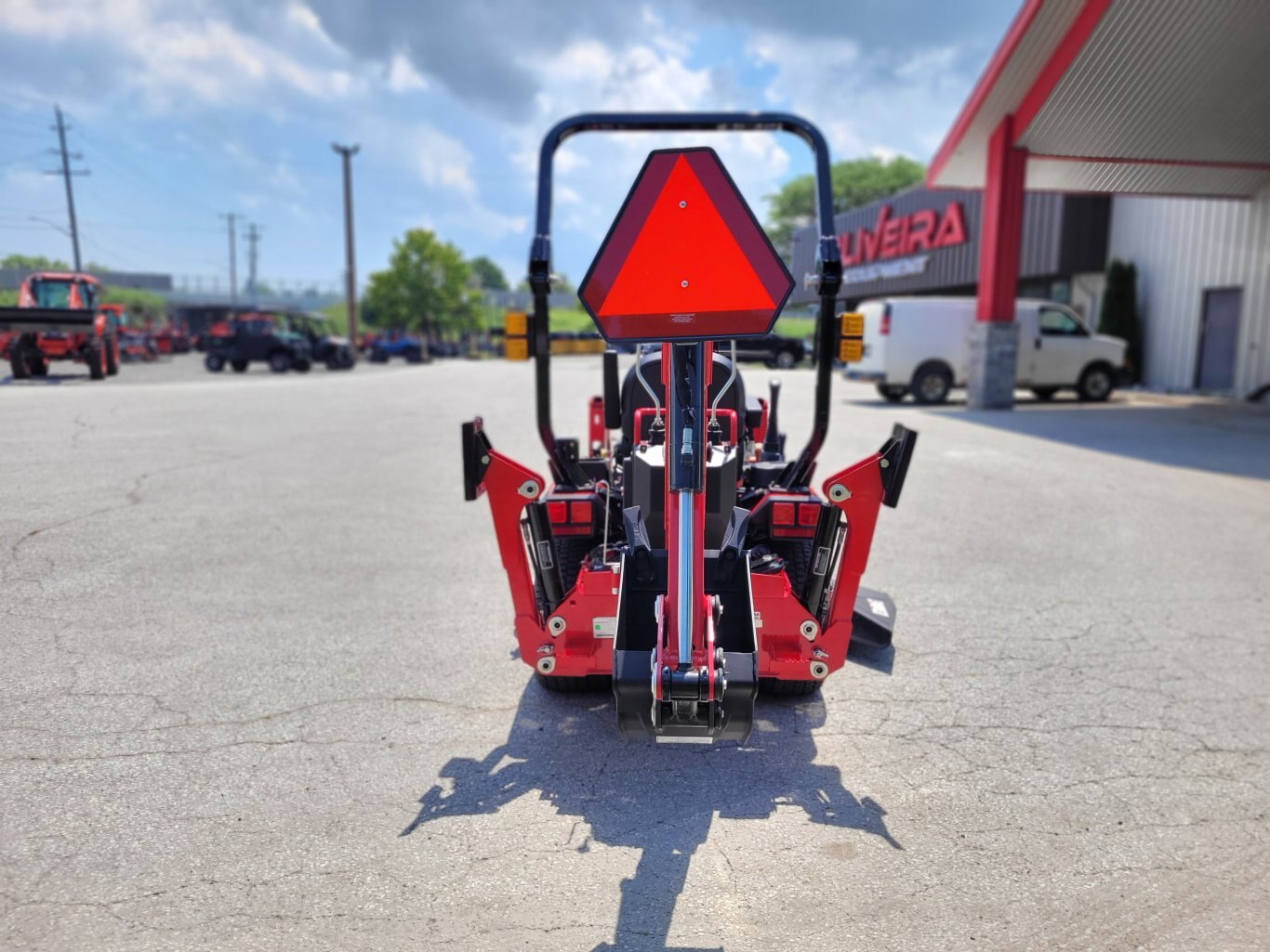 2025 Mahindra 1120 HST 20hp w/Loader, Backhoe, Mower Deck