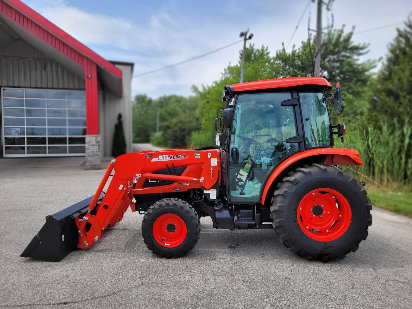 2025 Kioti NS6010 w/ cab & ldr