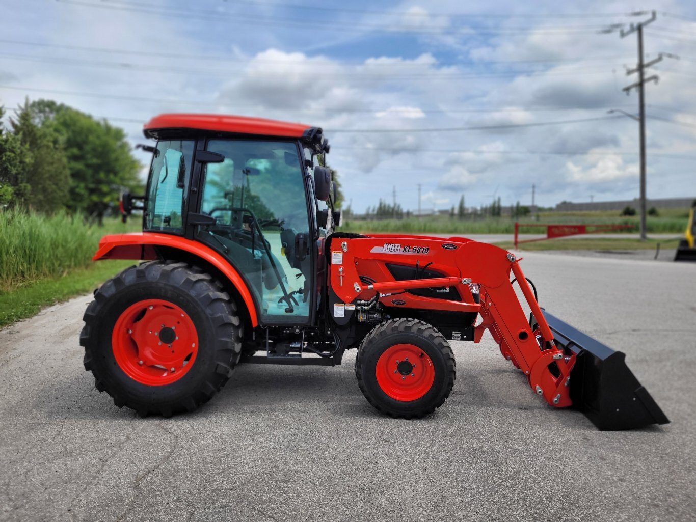 2025 Kioti NS6010 w/ cab & ldr