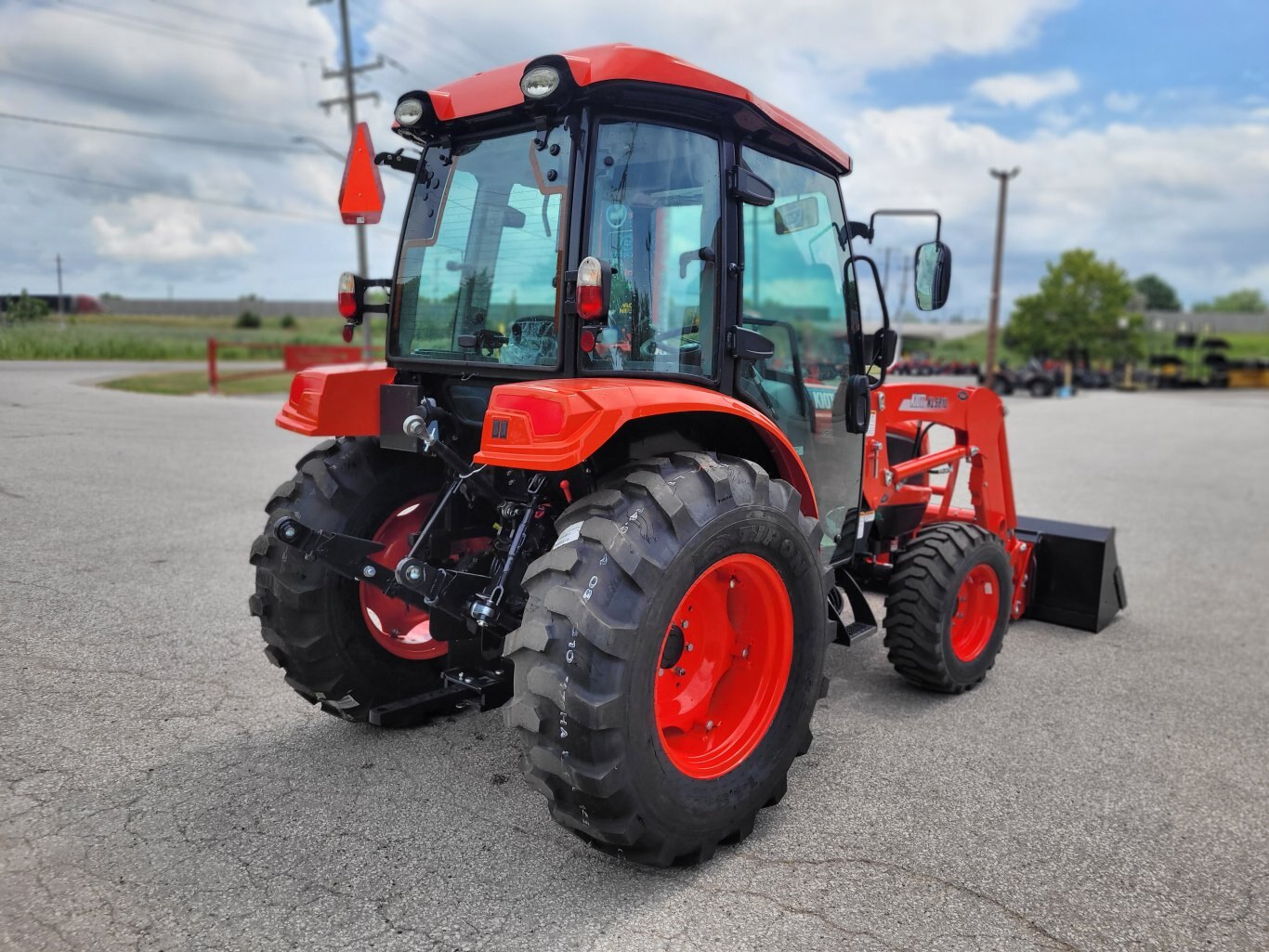 2025 Kioti NS6010 w/ cab & ldr
