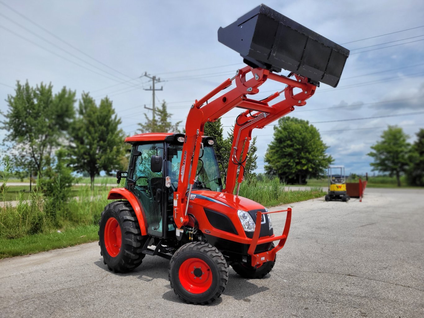 2025 Kioti NS6010 w/ cab & ldr