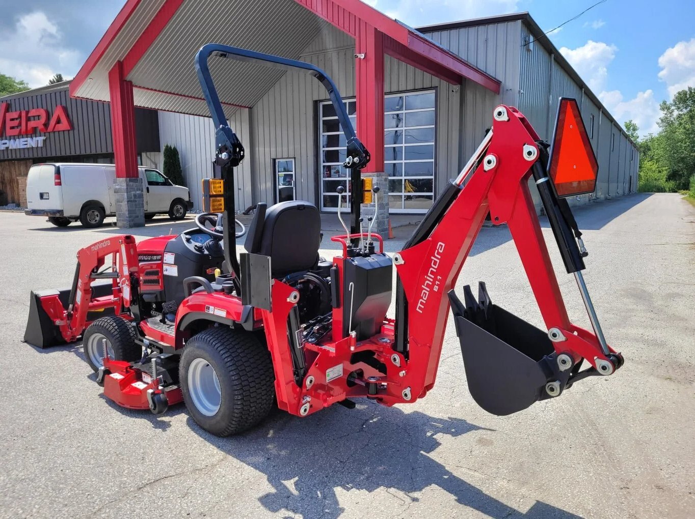 2026 Mahindra 1120 HST with Loader, Backhoe, Mower