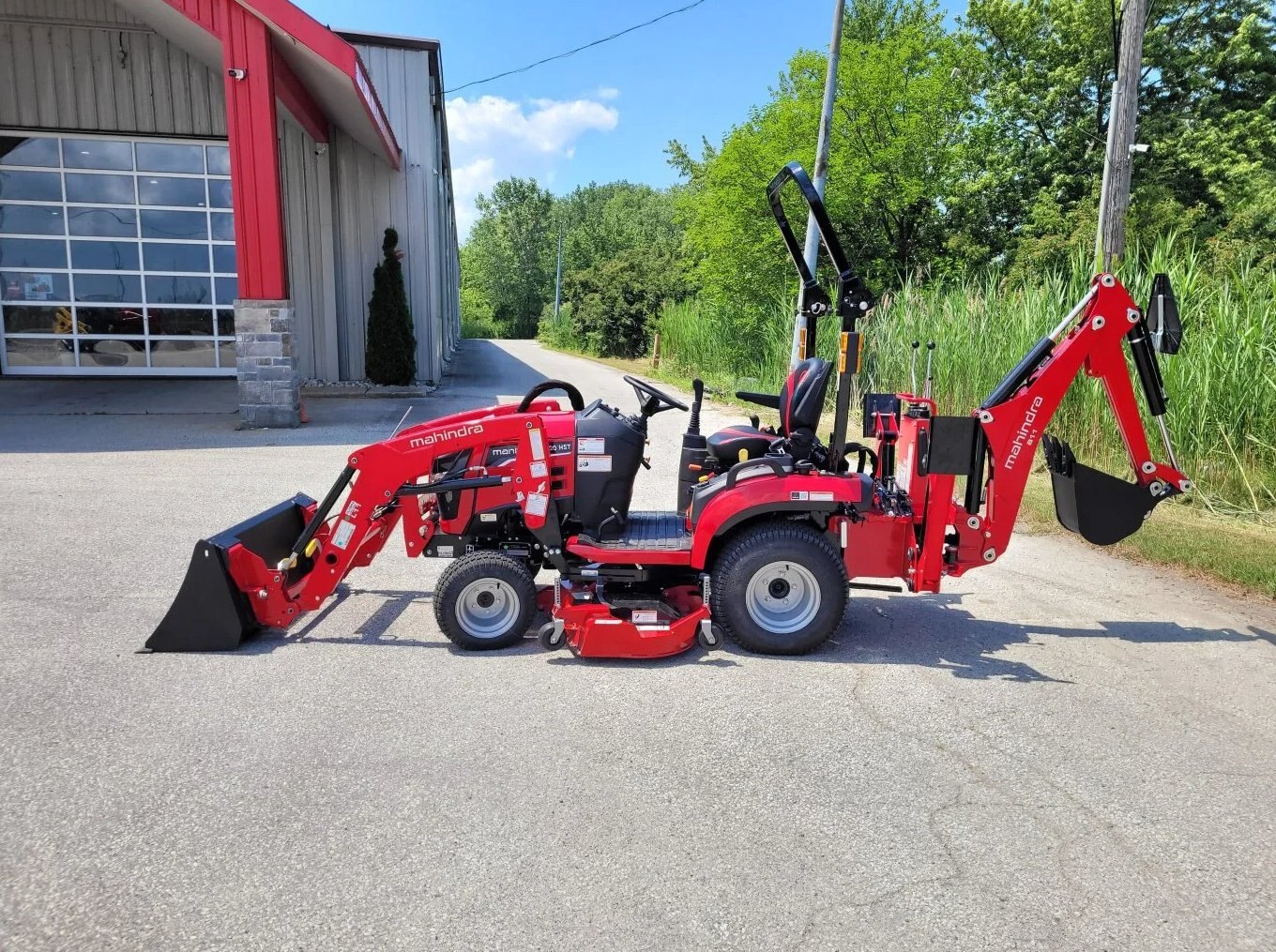 2026 Mahindra 1120 HST with Loader, Backhoe, Mower
