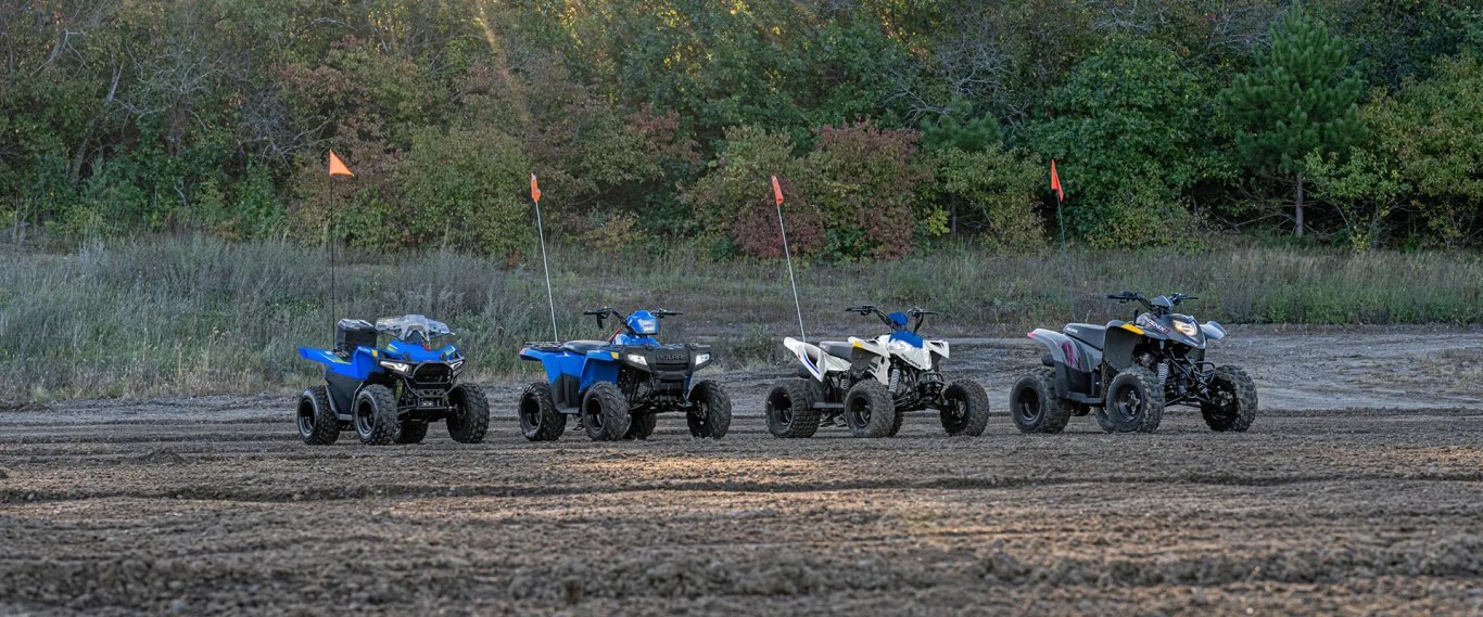 2025 Polaris Outlaw 70 EFI Velocity Blue / Fierce Fuchsia