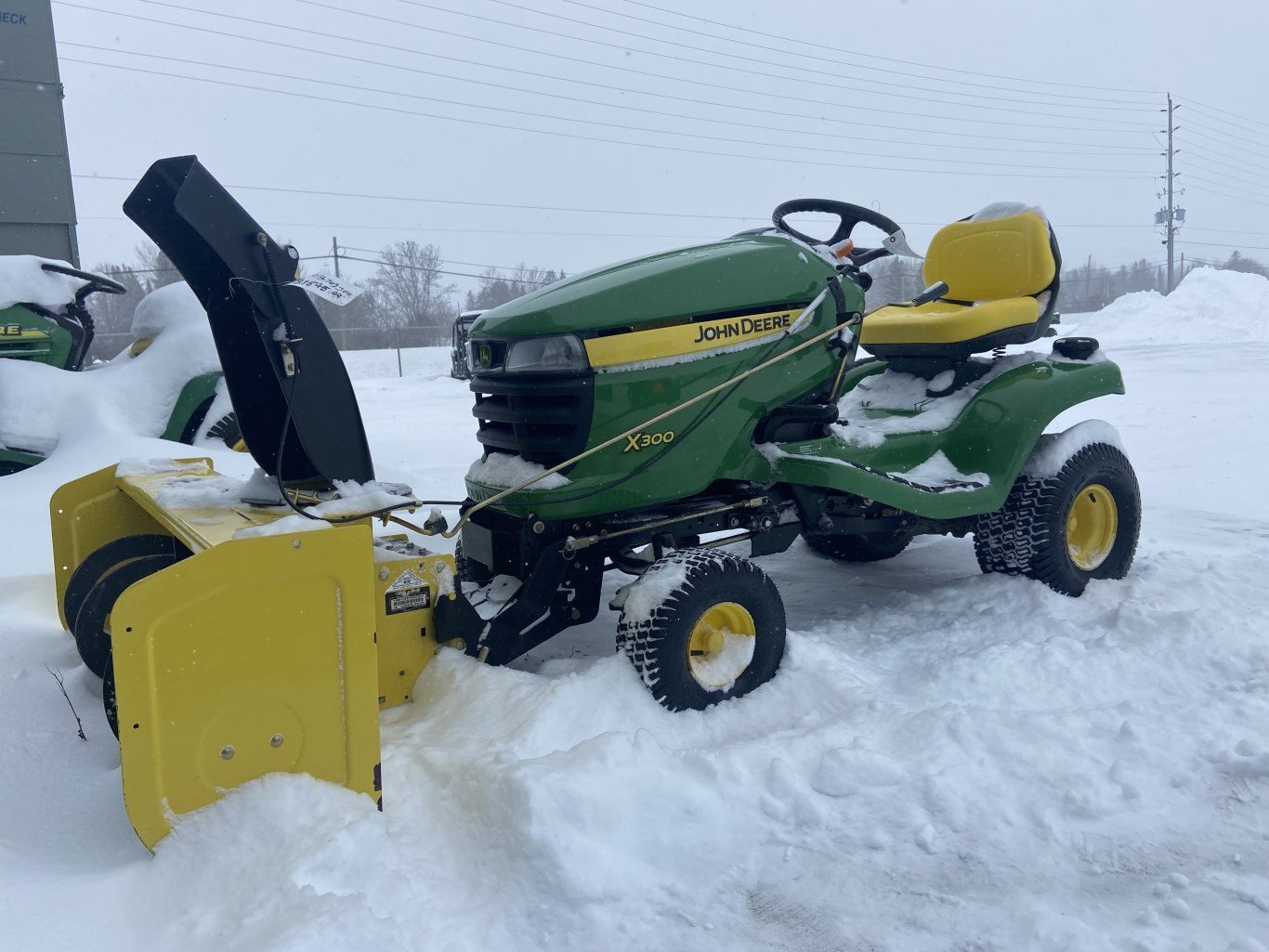 2011 JOHN DEERE X300 42 MULTCH DECK 44SNOWBLOWER