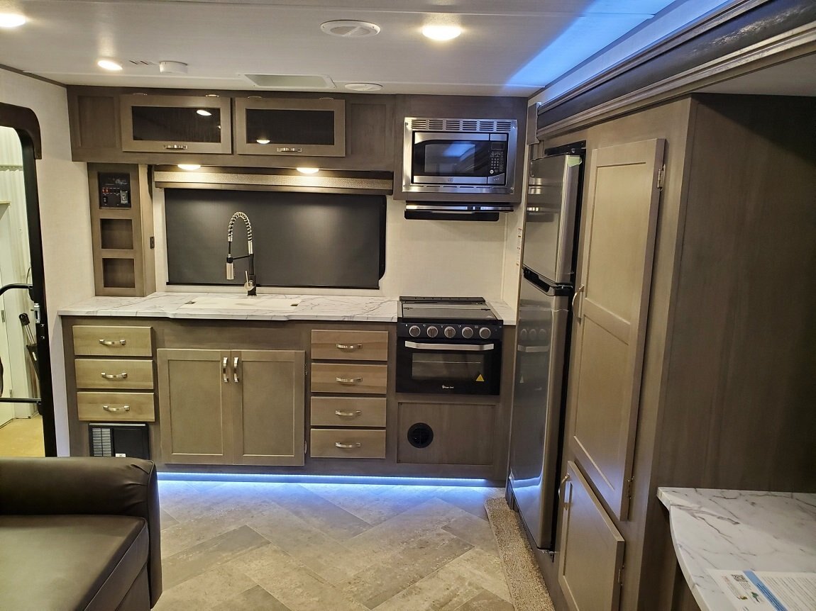 2025 East to West Alta 2350KRK King Bed Rear Kitchen