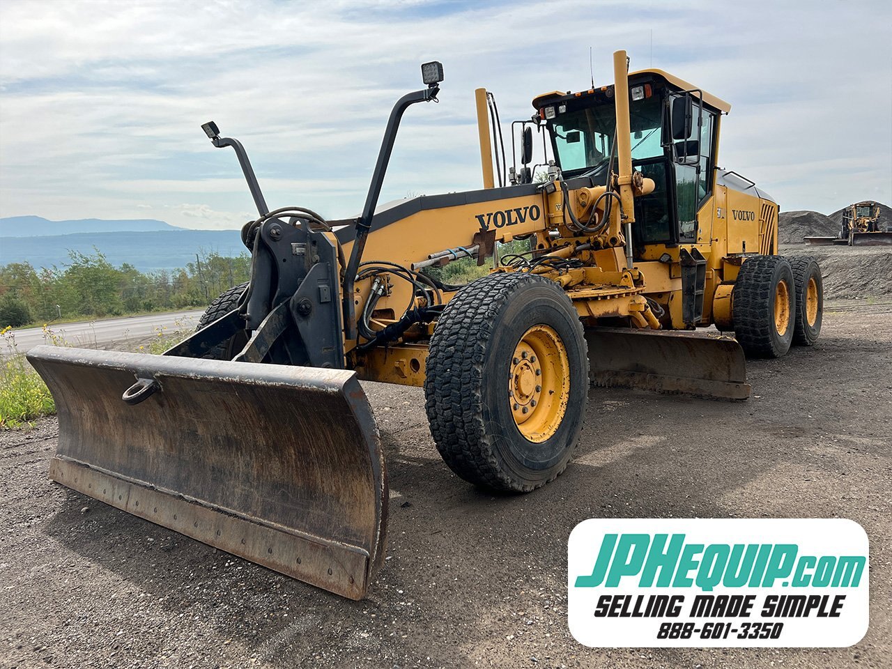 2010 Volvo G976 Motorgrader with snow wing and front dozer - 8941 JF