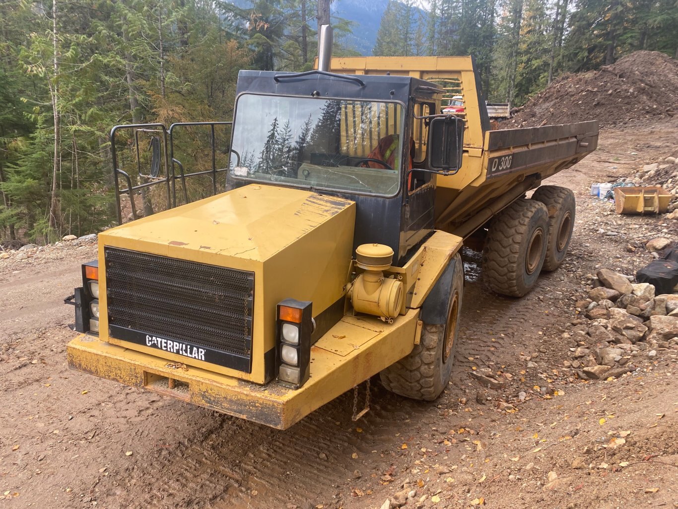 1995 Caterpillar D300D Articulated Rock Truck #9212 AS