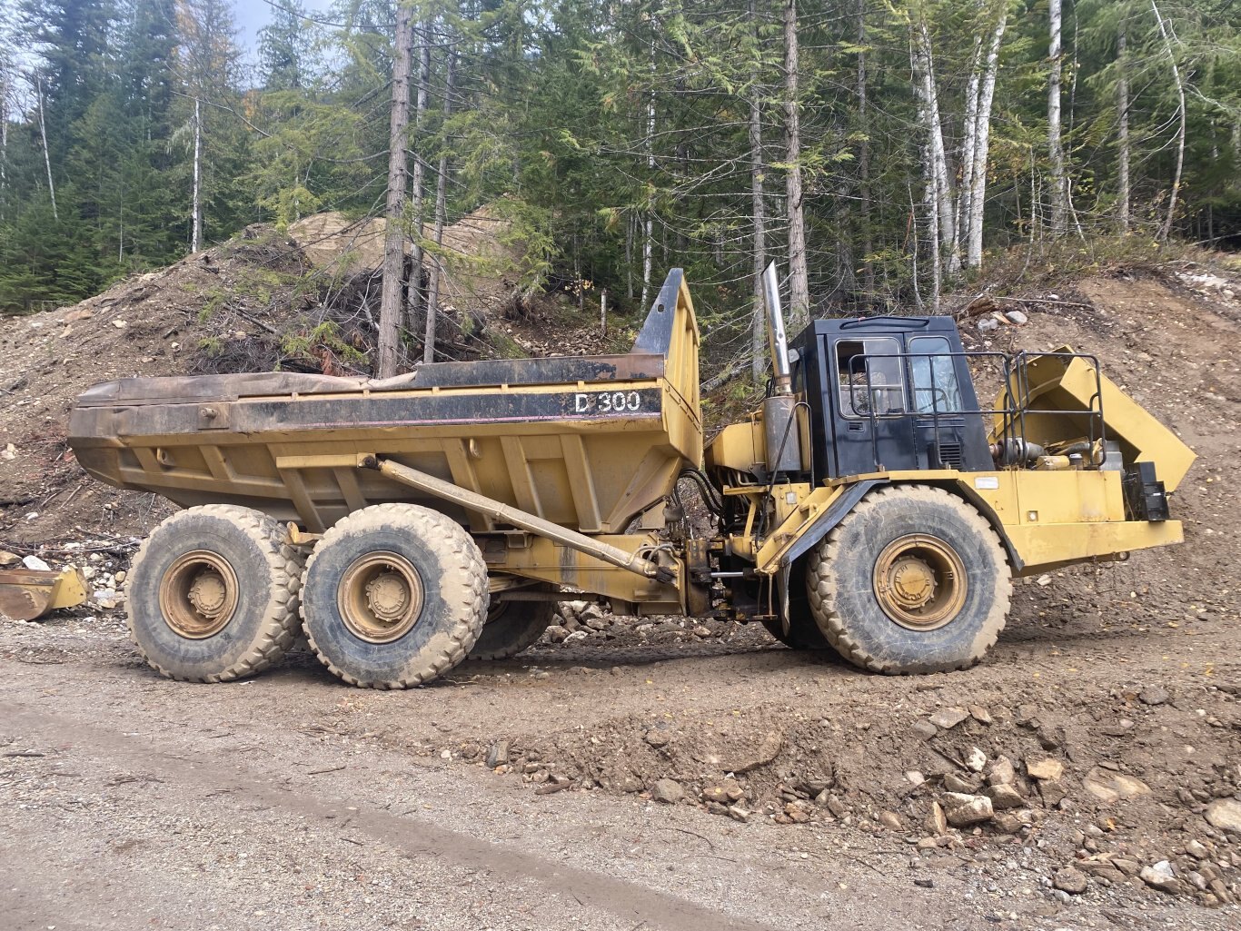 1995 Caterpillar D300D Articulated Rock Truck #9212 AS