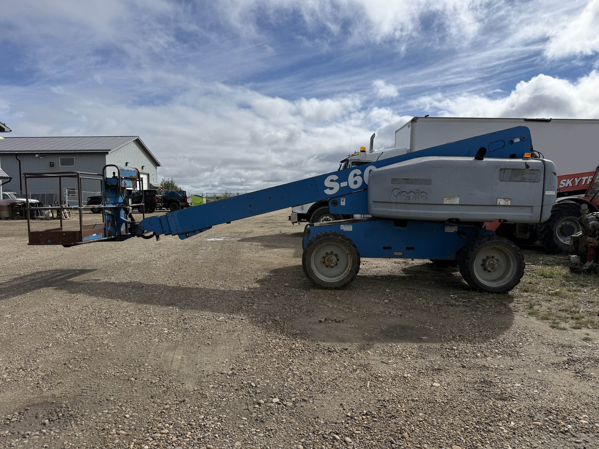 2006 Genie S 60 4WD Diesel Telescopic Boom Lift with Solid Tires #11354 JA