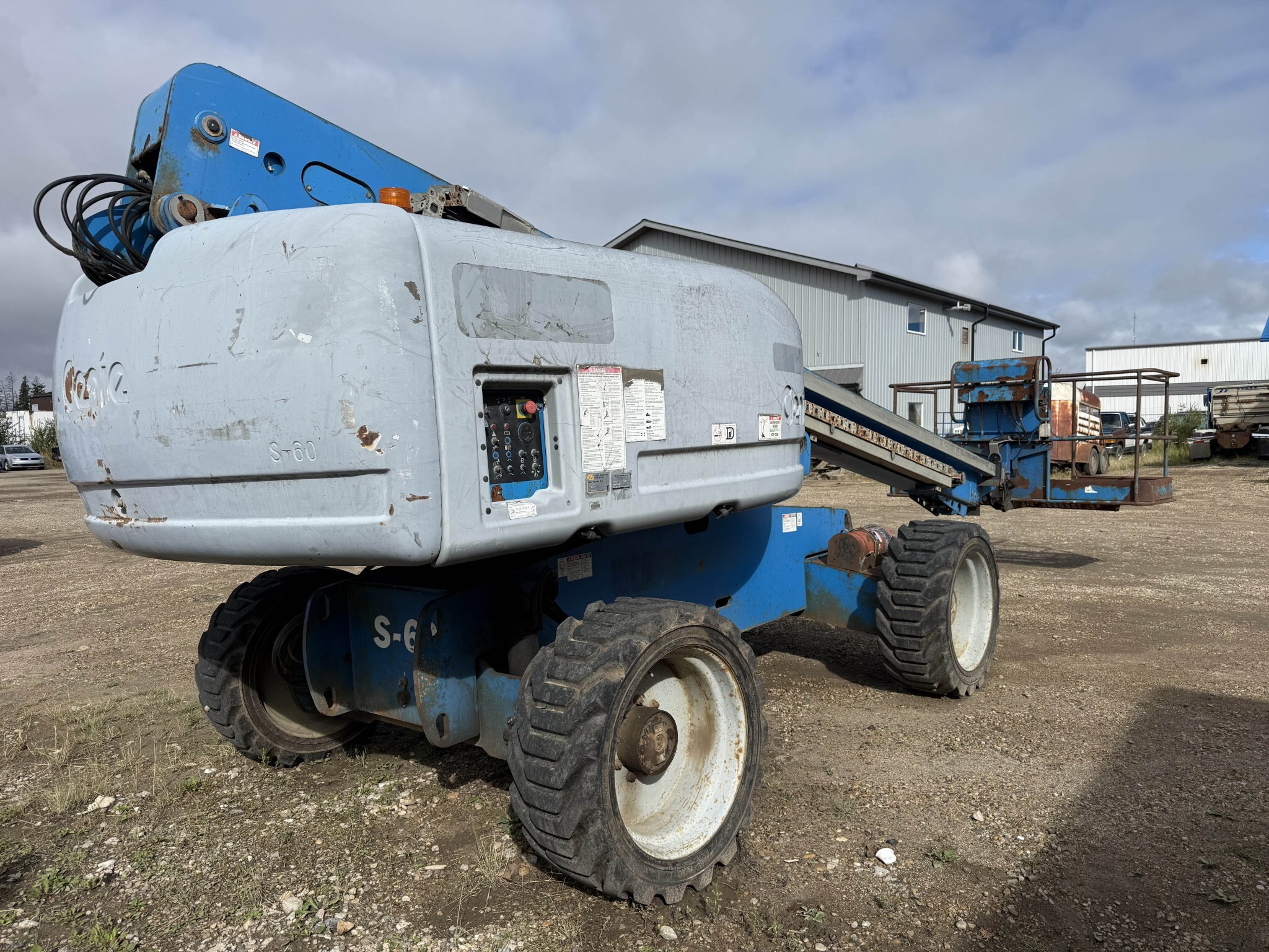 2006 Genie S 60 4WD Diesel Telescopic Boom Lift with Solid Tires #11354 JA