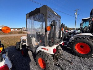 PRE OWNED 2025 BOBCAT CT1021 w/ BLOWER, FRONT END LOADER, BERCOMAC SOLF CAB