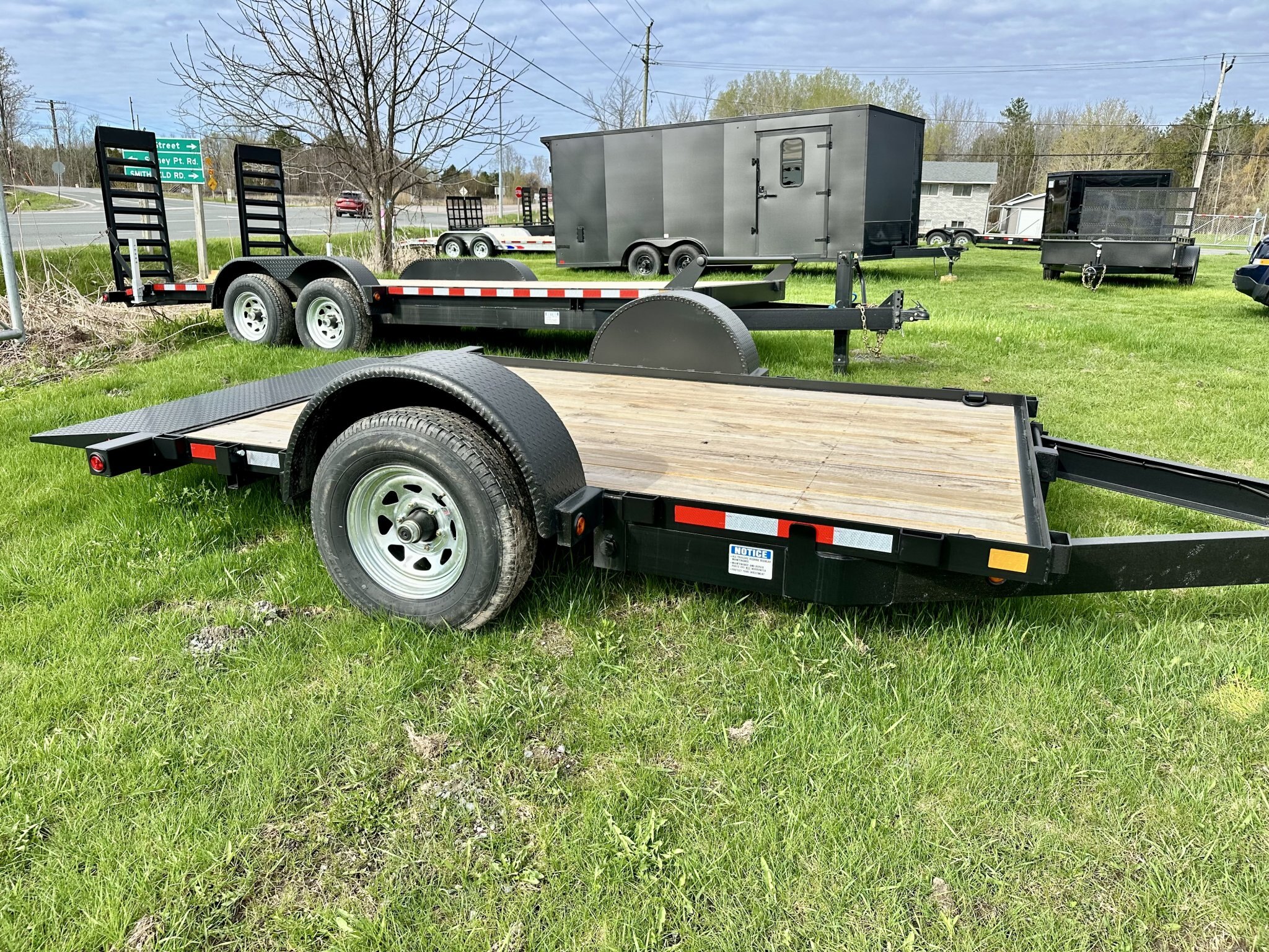 NEW CANADA TRAILER 7X12 5K GRAVITY TILT